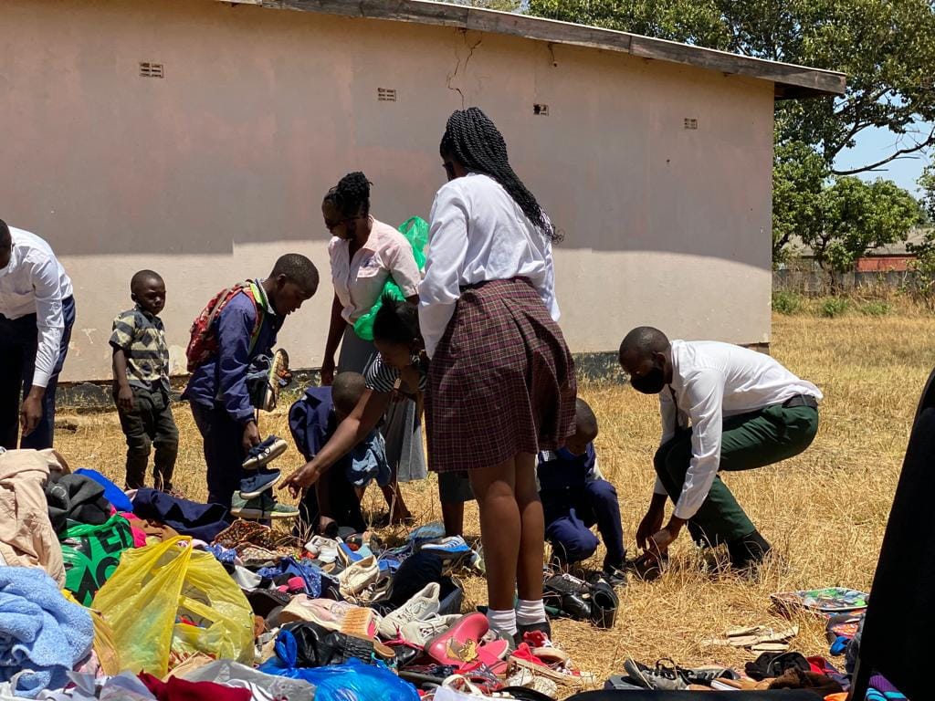 Church members sorting donated goods during an outreach