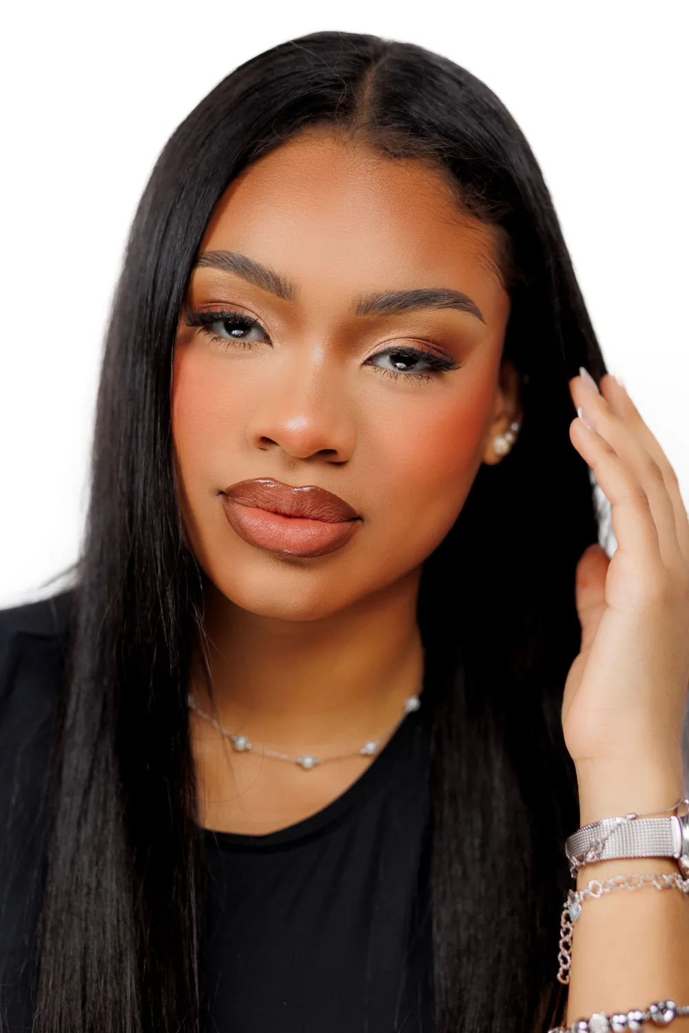 Woman with sleek bone-straight hair